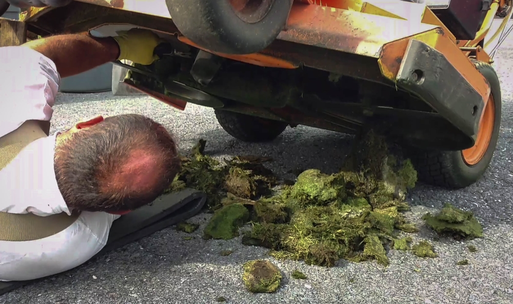 Changing mower blades and cleaning under the deck